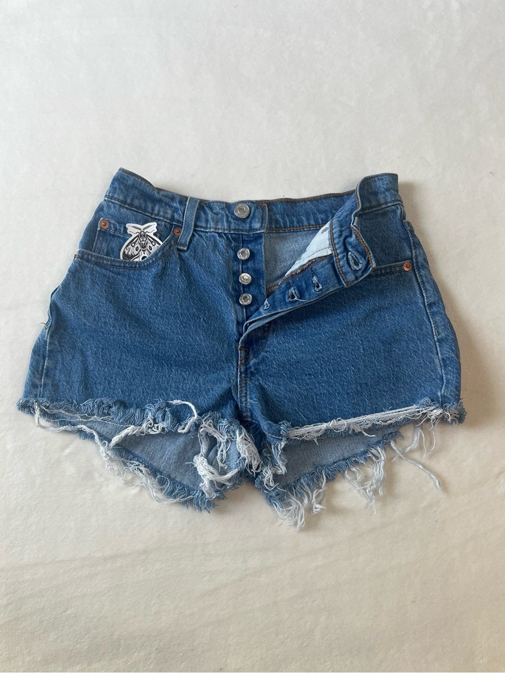 Blue Levi’s 501 Shorts with Frayed Hem